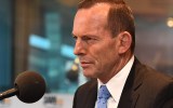 Former Prime Minister Tony Abbott speaks to Neil Mitchell at the 3AW studio in Melbourne, Thursday, Oct. 1, 2015. Abbott refused to say if he has forgiven Malcolm Turnbull for taking his job. (AAP Image/Julian Smith) NO ARCHIVING