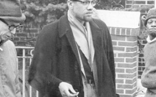 Malcolm X (c), the African-American civil rights leader was assassinated in 1965.