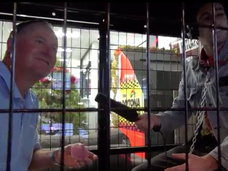 The PM inside the cage.