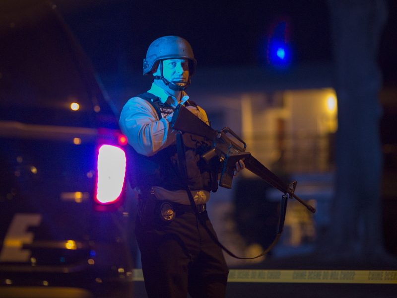 Police raid a home possibly linked to the mass shooting.