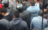 The heavily armed brawl spilled outside the jail.