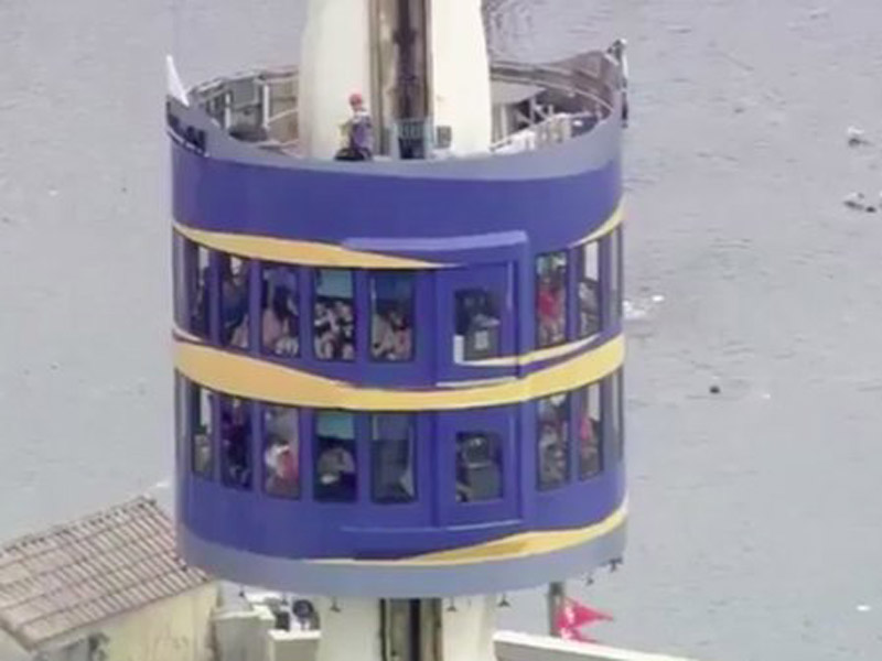 People anxiously wait in the Sky Tower. Twitter