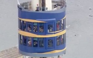 People anxiously wait in the Sky Tower. Twitter