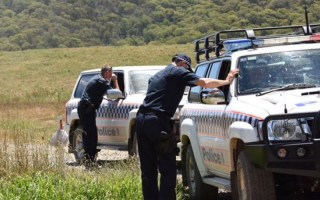 Police search bush land around Lake Buffalo, in Victoria's north-east.