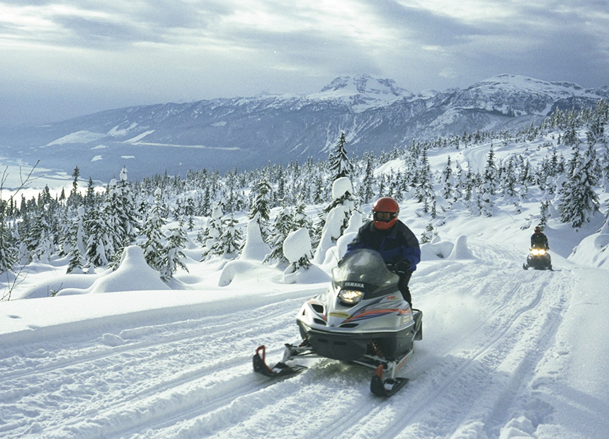 Canadia Rocky Mountains snow mobile Getty