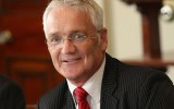 Mr Drum was an AFL footballer and coach before entering politics.