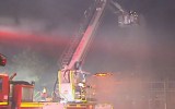 Firefighters used a cherry picker to bring the fire under control.