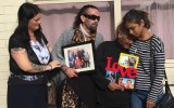 Grieving mother Donna Rigney (2nd right) comforted by other family members in Adelaide