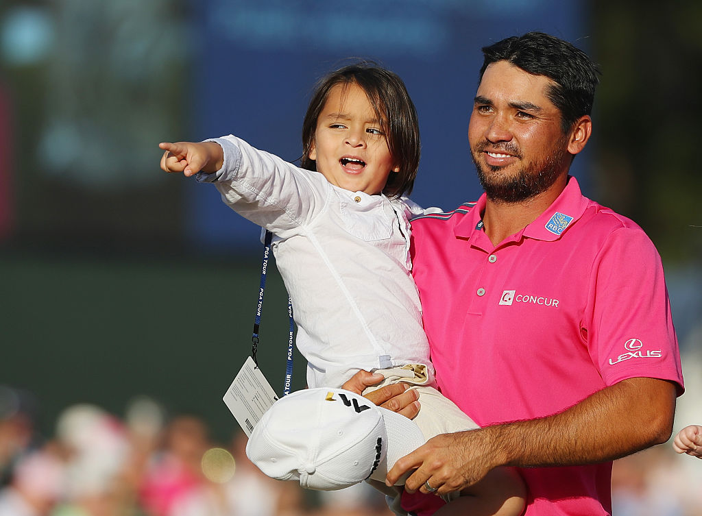 Jason Day with son Dash after winning the Players Championship in Florida.