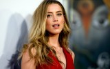 amber heard sues producer over sex scene