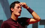 Tomic said he was feeling ill. Photo: Getty.