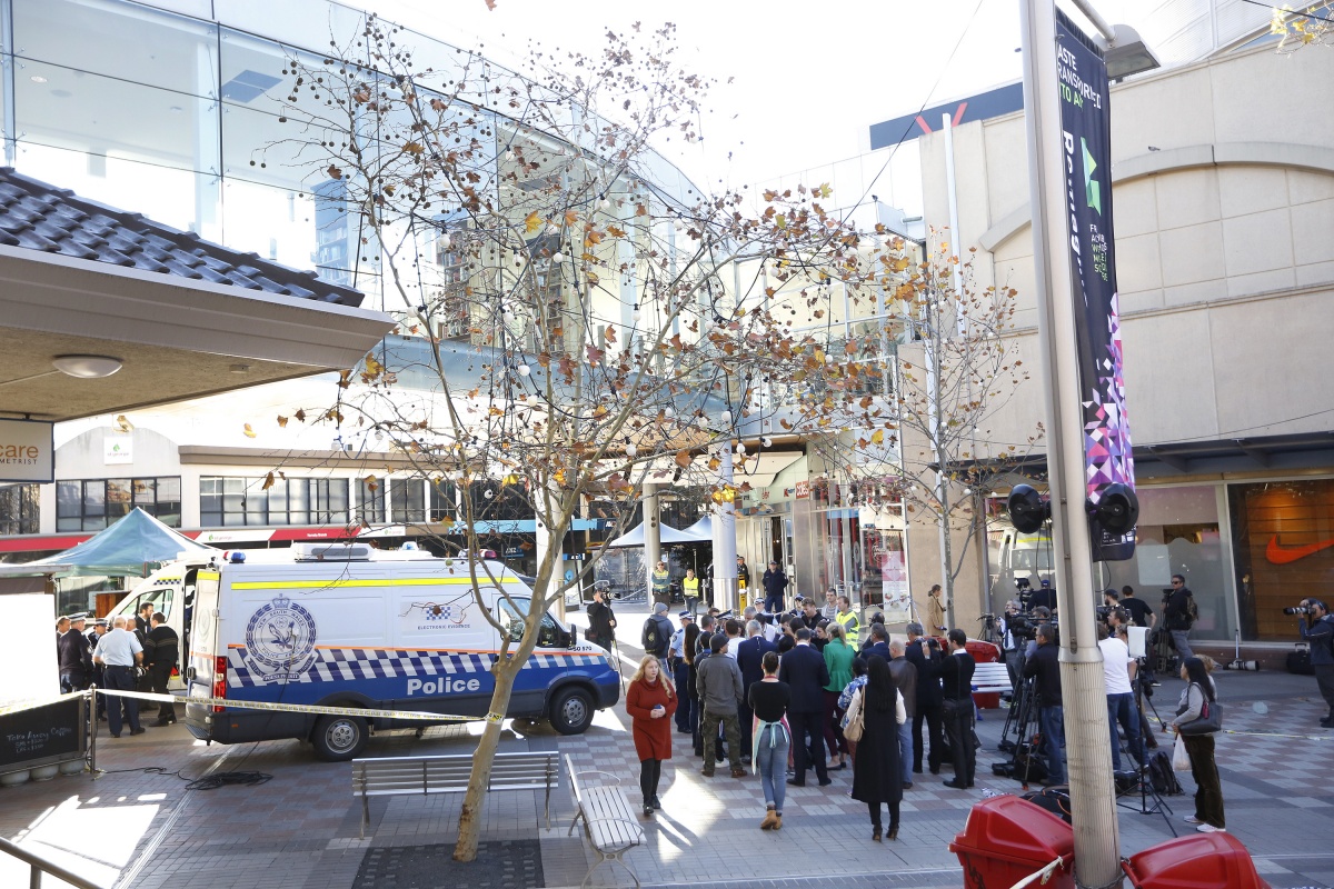 Four people wounded in Hornsby market police shooting.