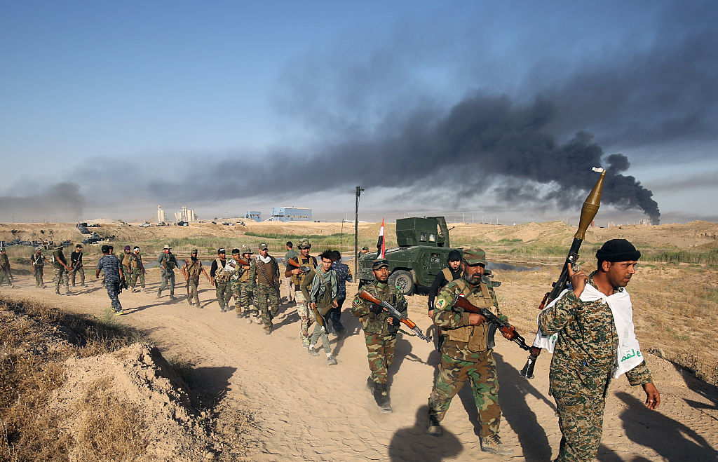 Iraqi pro-government forces advance towards Fallujah late last month.
