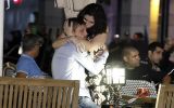 Israelis embrace after the shopping centre shooting attack.