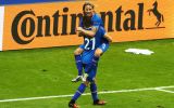 Iceland's Birkir Bjarnason and Arnor Ingvi Traustason celebrate.
