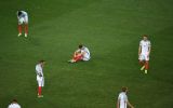 Crestfallen English players after the defeat.