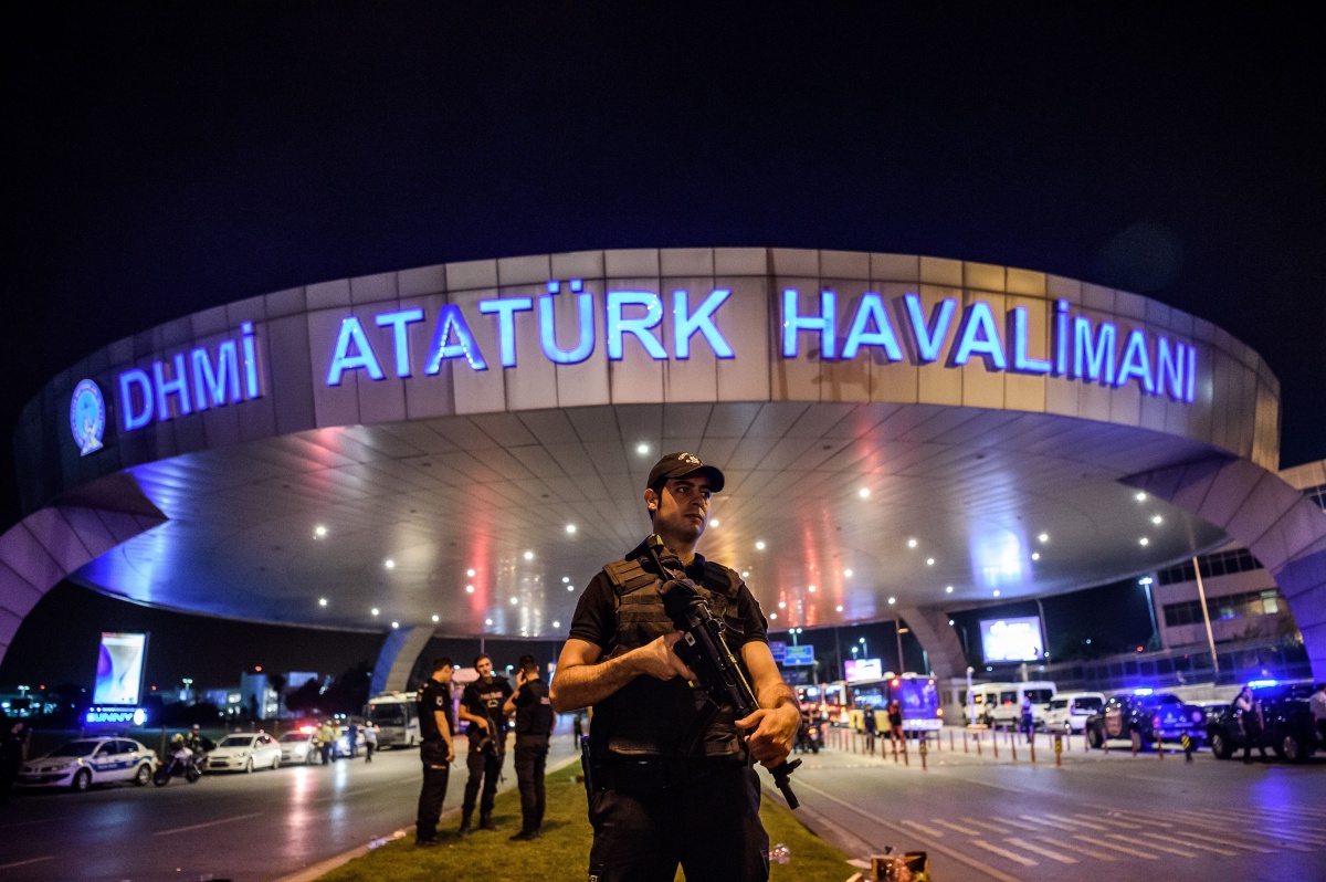 A Turkish riot police officer patrols Ataturk airport in Istanbul.