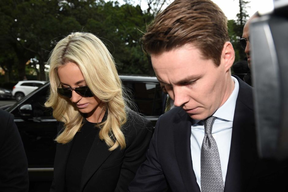 Oliver Curtis and wife Roxy Jacenko arrive at court on Friday.