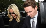 Oliver Curtis and wife Roxy Jacenko arrive at court on Friday.