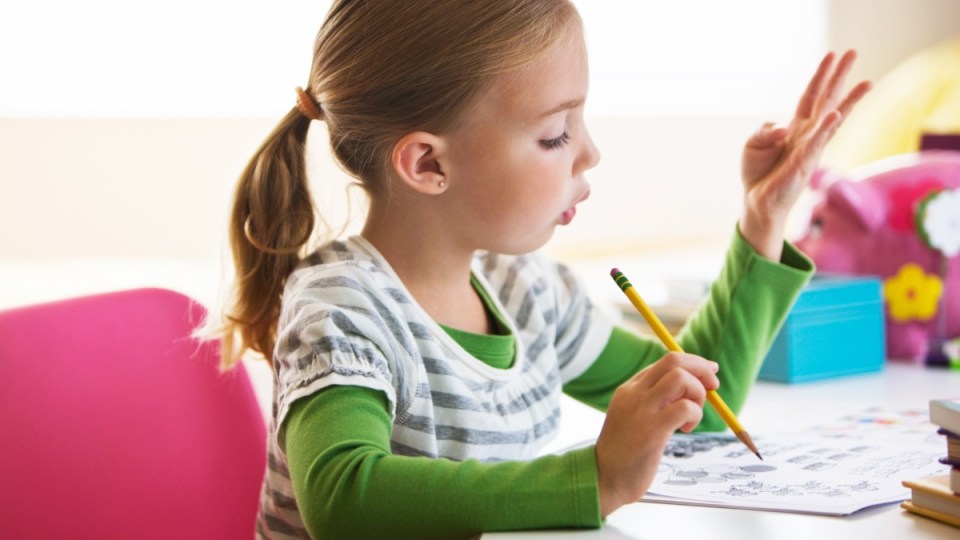 young girl counting