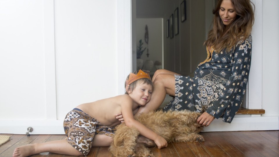 woman with dog and child