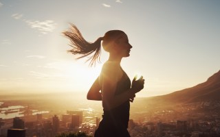 Female jogger in the sun
