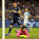 Besart Berisha runs by Dean Bouzanis