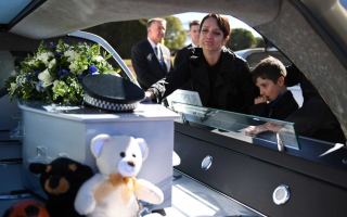 Brett Forte's family farewell his casket