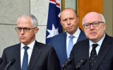 Malcolm Turnbull, Peter Dutton and George Brandis are pictured making the announcement on Tuesday.
