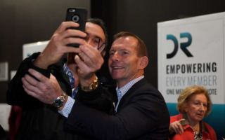 Tony Abbott poses for a selfie
