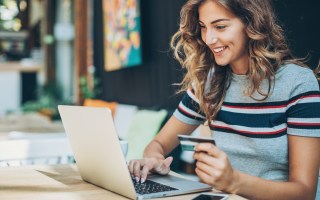 happy woman credit card