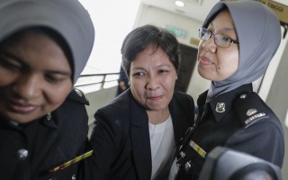 Sydney mother Maria Exposto has been found not guilty of smuggling 1.1kg of ice into Malaysia.