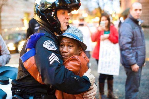 Devonte Hart hugs police officer