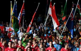 Athletes are seen before the start of the closing ceremony