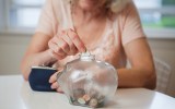 Budget: A woman places her superannuation in an account