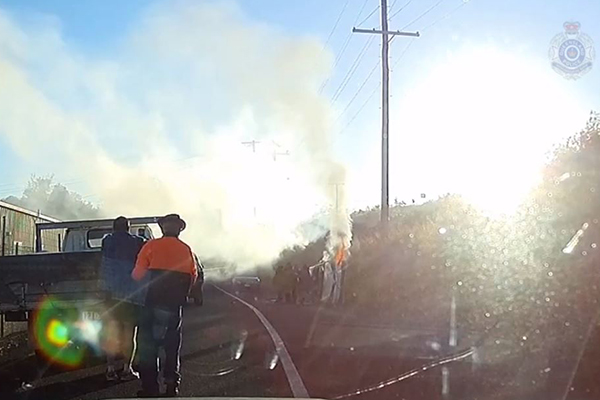 hero cops burning car