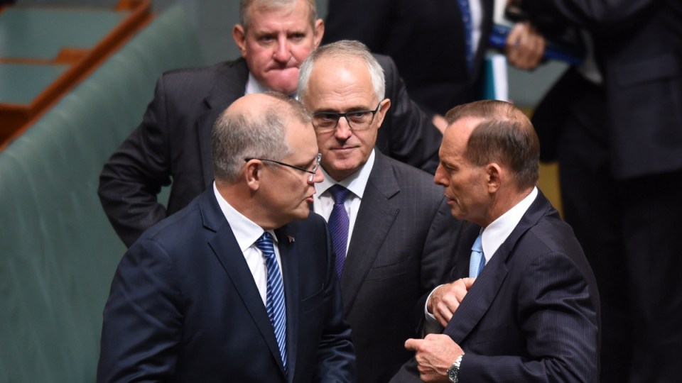 Tony Abbott, Malcolm Turnbull, and Scott Morrison on the floor of Parliament.