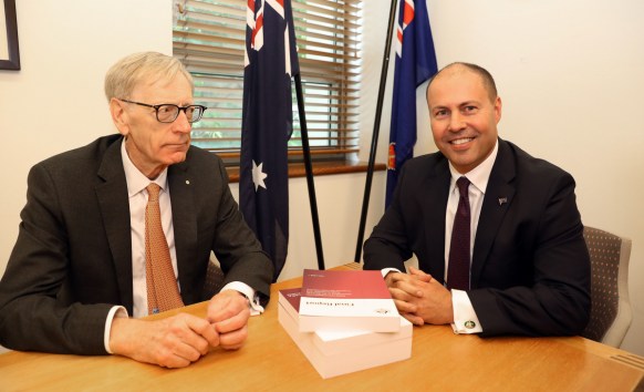 Commissioner Kenneth Hayne and Treasurer Josh Frydenberg (right) are seen with the final report from the Royal Commission into Misconduct in the Banking, Superannuation and Financial Services Industry, at Parliament House in Canberra, Friday, February 1, 2019.