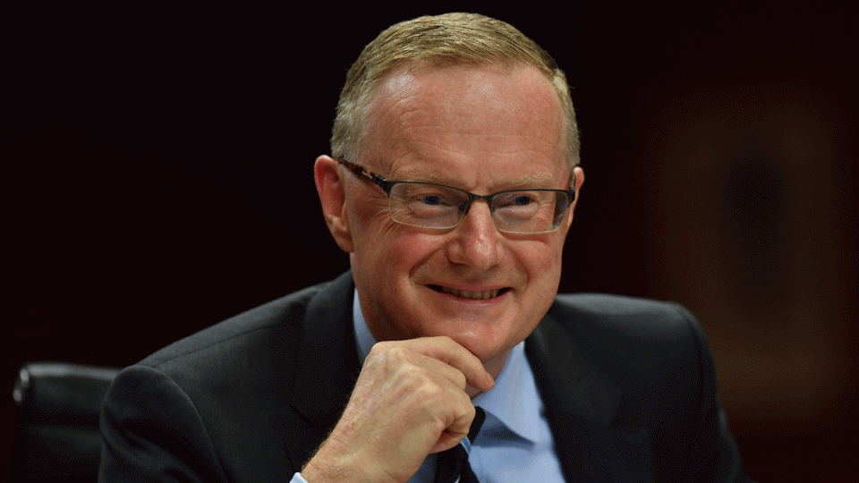 RBA Governor Philip Lowe smiling.