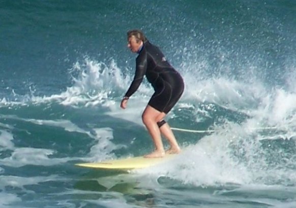 Photo of Belinda surfing
