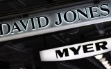 Signs for David Jones and Myer hang from an awning.