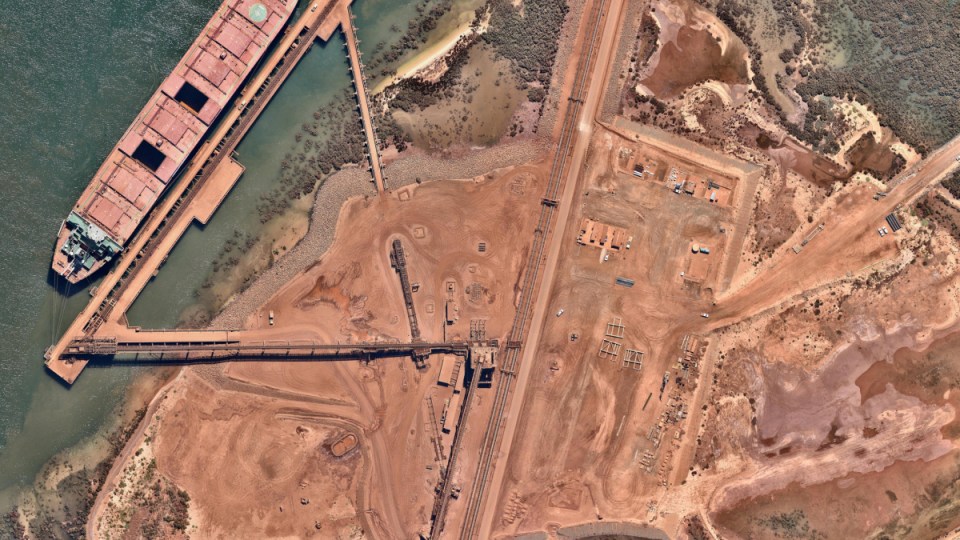 slow economy buoyed by iron ore prices