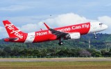 An AirAsia flight takes off.