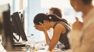 pictured is someone with burnout