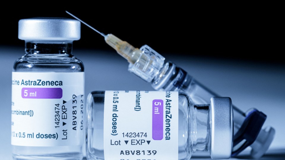This picture shows vials of the AstraZeneca Covid-19 vaccine and a syringe in Paris on March 11, 2021. - European countries can keep using AstraZeneca's coronavirus vaccine during an investigation into cases of blood clots that prompted Denmark, Norway and Iceland to suspend jabs, the EU's drug regulator said on March 11, 2021.