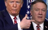 President Donald Trump directs questions to Secretary of State Mike Pompeo during a news briefing on the latest development of the coronavirus outbreak in the U.S