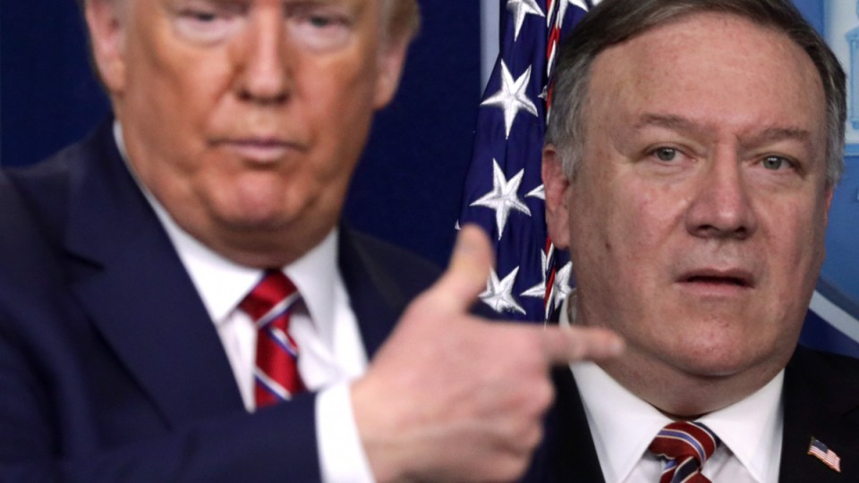 President Donald Trump directs questions to Secretary of State Mike Pompeo during a news briefing on the latest development of the coronavirus outbreak in the U.S