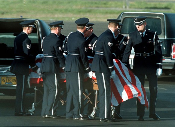 rwanda murderers settled australia