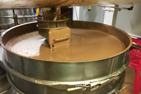 A vat of chocolate churns in Melbourne's Mondelez factory.