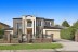 The home had four bedrooms upstairs, two with ensuites. Photo: